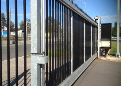 black and silver, automated, sliding gate
